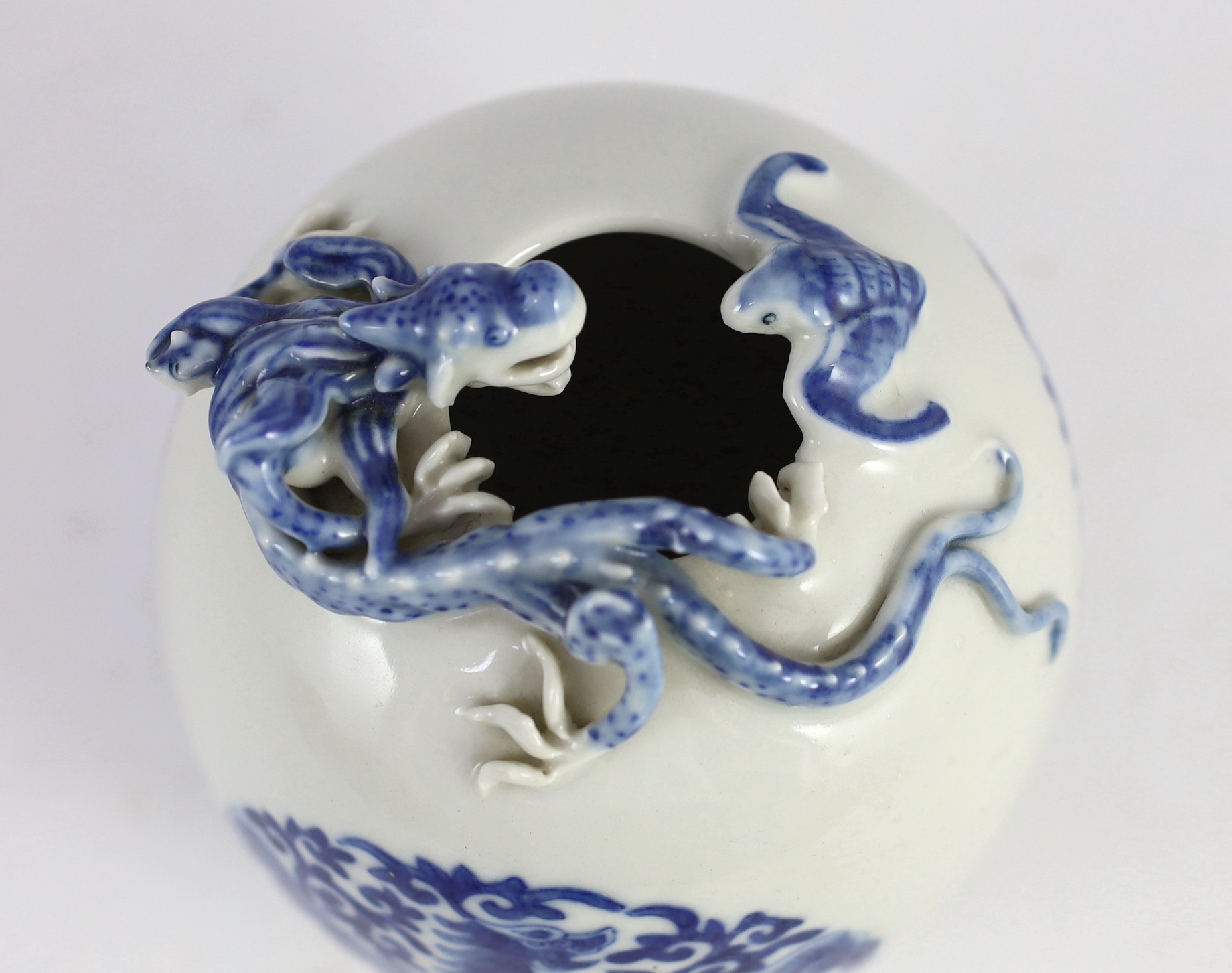 A Chinese ovoid 'dragon' vase, 19th century or later, 17.5cm high